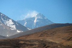 11 Mount Everest North Face Pokes Up Above The Hills From The Pass Between Tingri And Mount Everest North Base Camp In Tibet.jpg